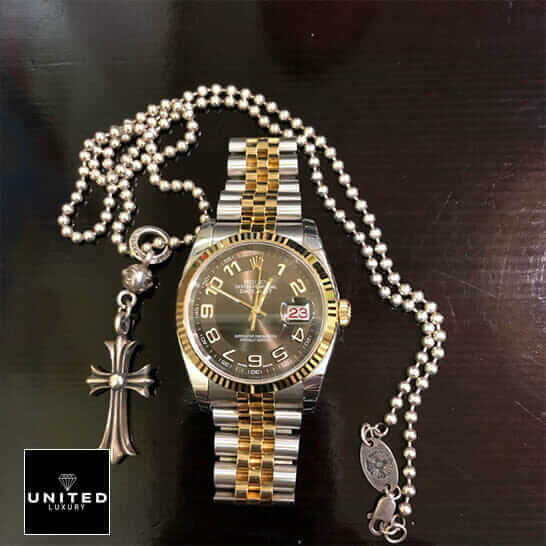 Rolex 116233 Replica 6 Rolex Datejust Steel Yellow Gold 116233 Replica next to the necklace